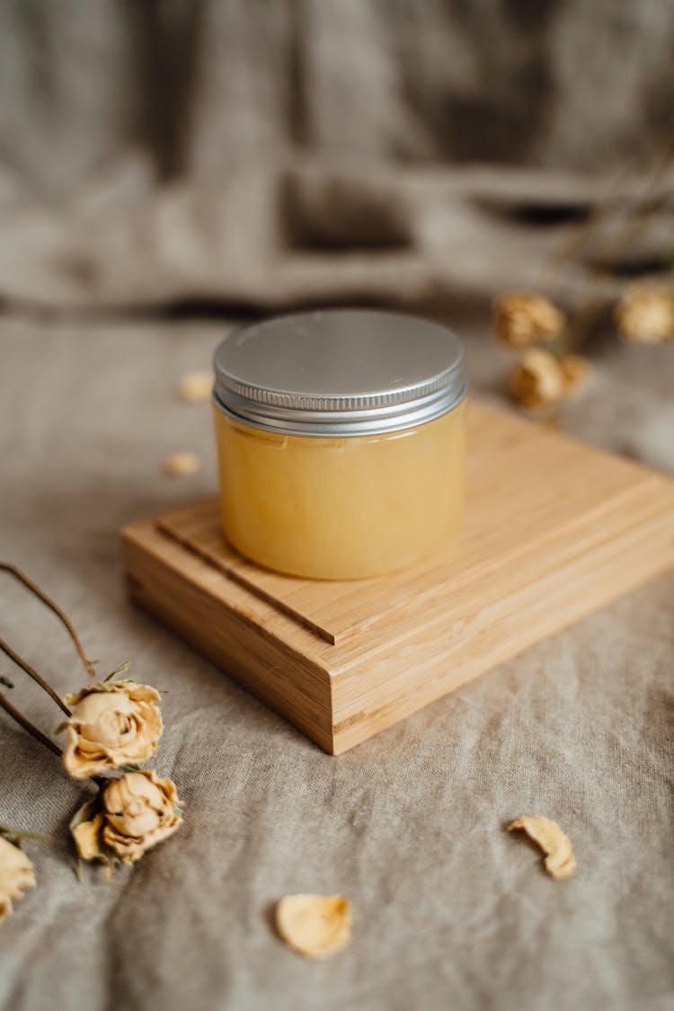 Ointment In A Clear Container With Metal Lid