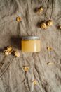 Yellow Cream in a Plastic Container