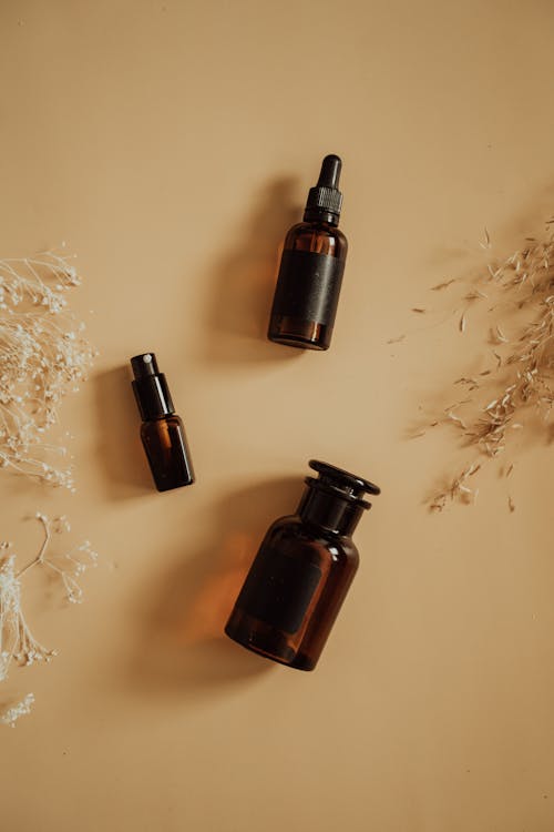 Flatlay Shot of Brown Bottles 