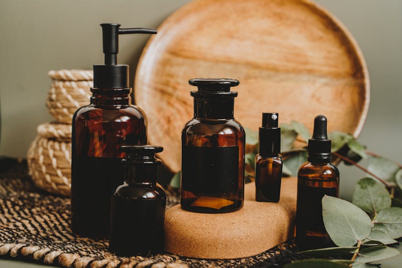 bottles of essential oils including castor oil and olive oil