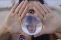 Person Holding Clear Glass Ball
