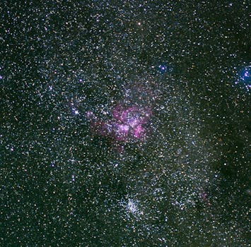 A captivating view of a star-studded night sky featuring a vibrant nebula.