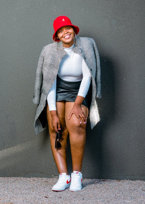 Woman in White Long Sleeve Shirt and Gray Coat