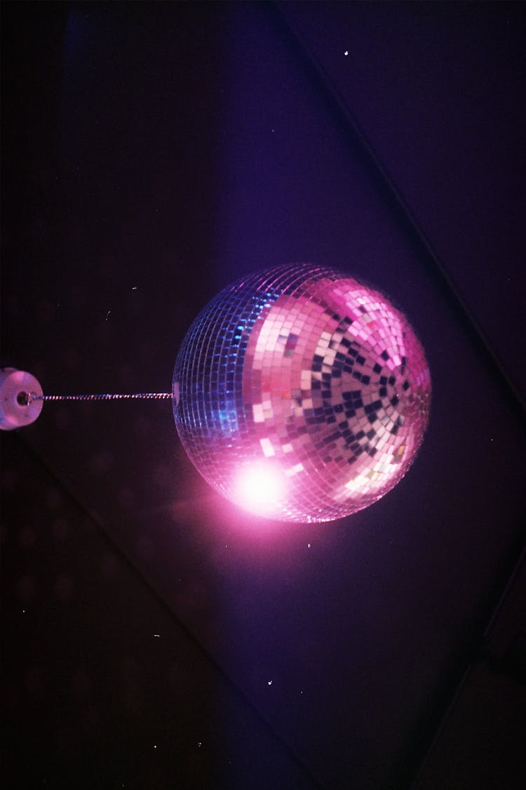 Shiny Disco Ball Lamp Placed In Dark Room