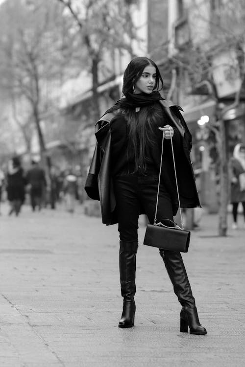 Woman in Black Jacket and Black Pants 