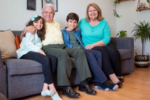 Enjoyable family time with grandparents and grandchildren at home.