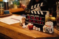 Digital Clock Beside the Cat Figurines