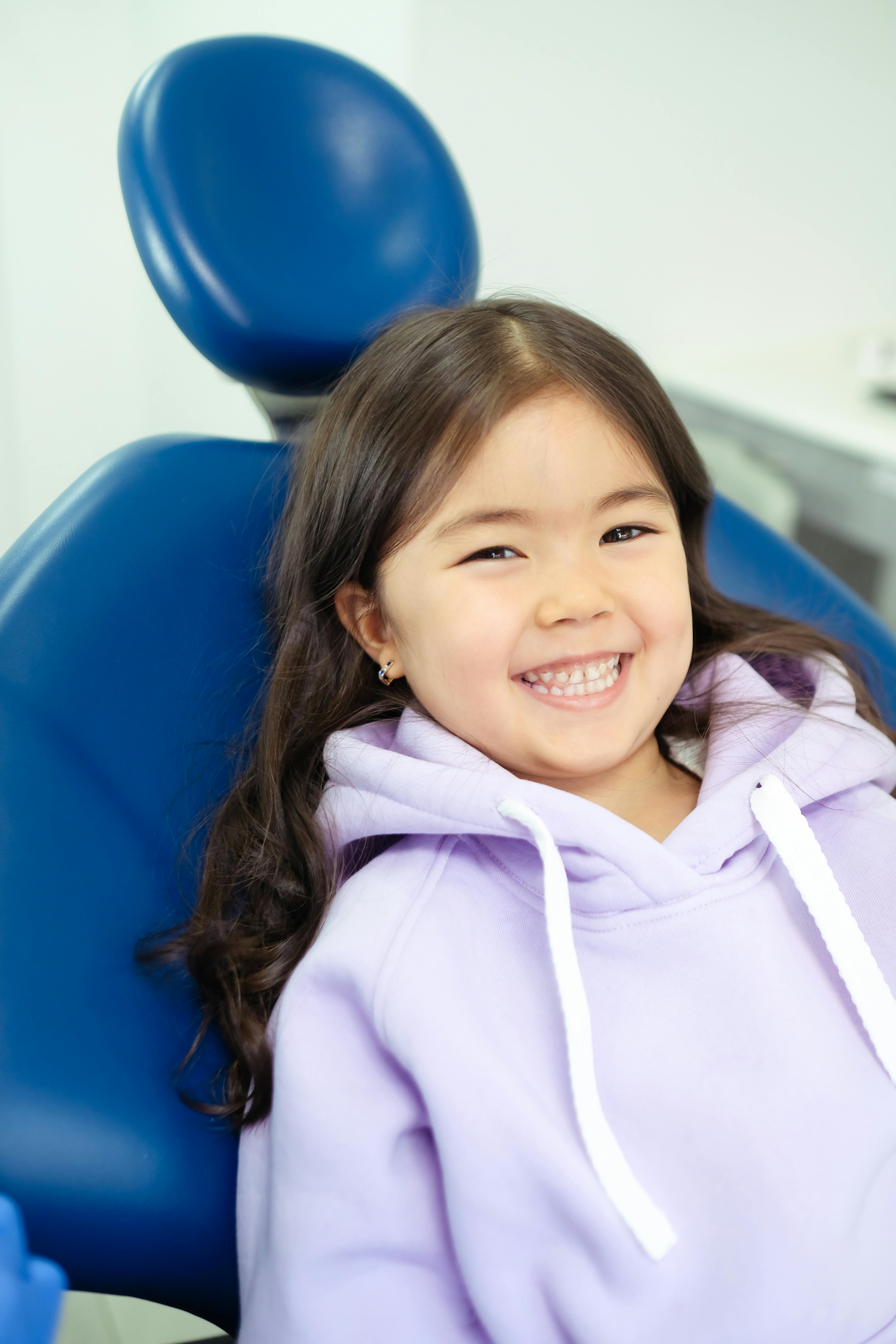 Child Smiling on Camera · Free Stock Photo