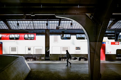 Man Walking on Train Station