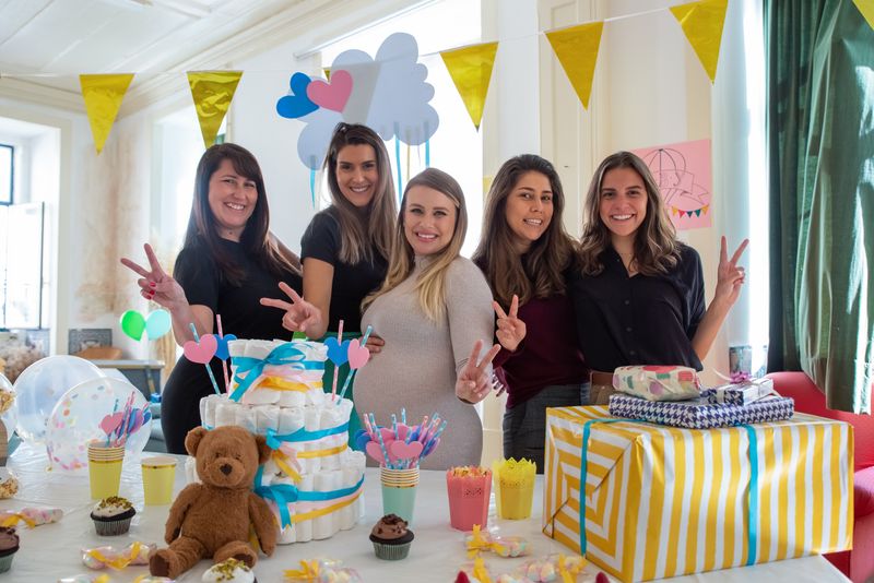 Guests playing baby shower games at a celebration