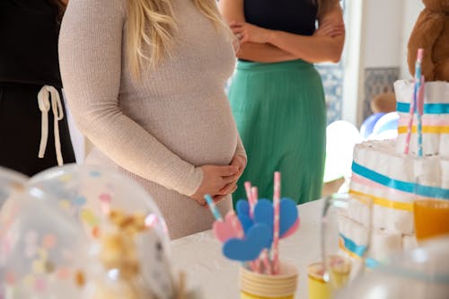 A Woman with Her Hands on Her Belly