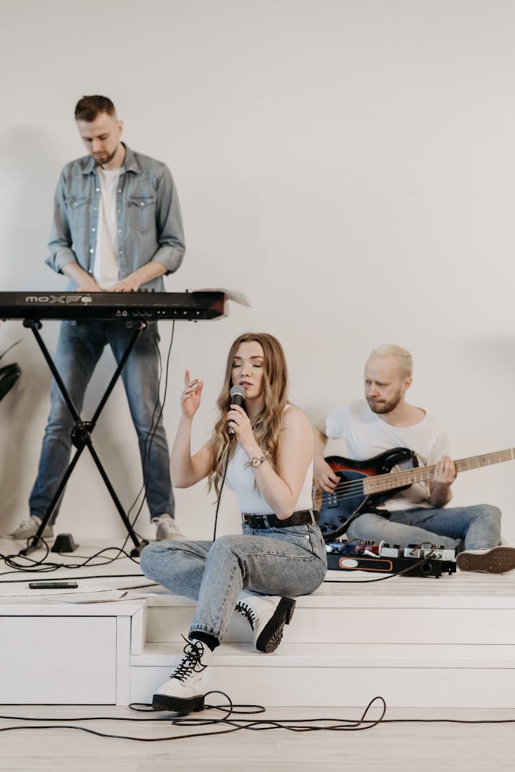 A Band Practicing A Performance