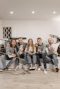 Members Of The Band Sitting Closely