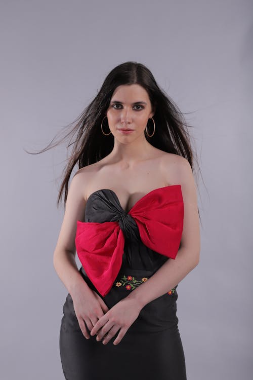 Woman in Red and Black Dress