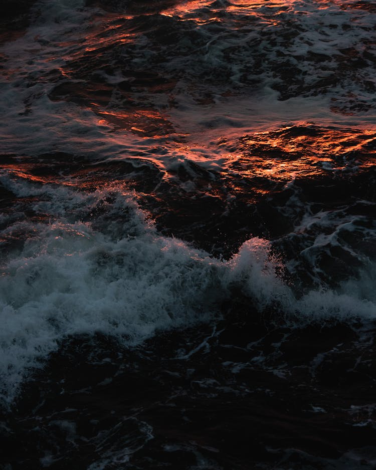 Stormy Foamy Sea Waves At Sunset