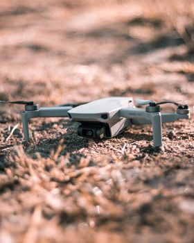 Drone with high resolution digital on dirt for shooting nature in rural area