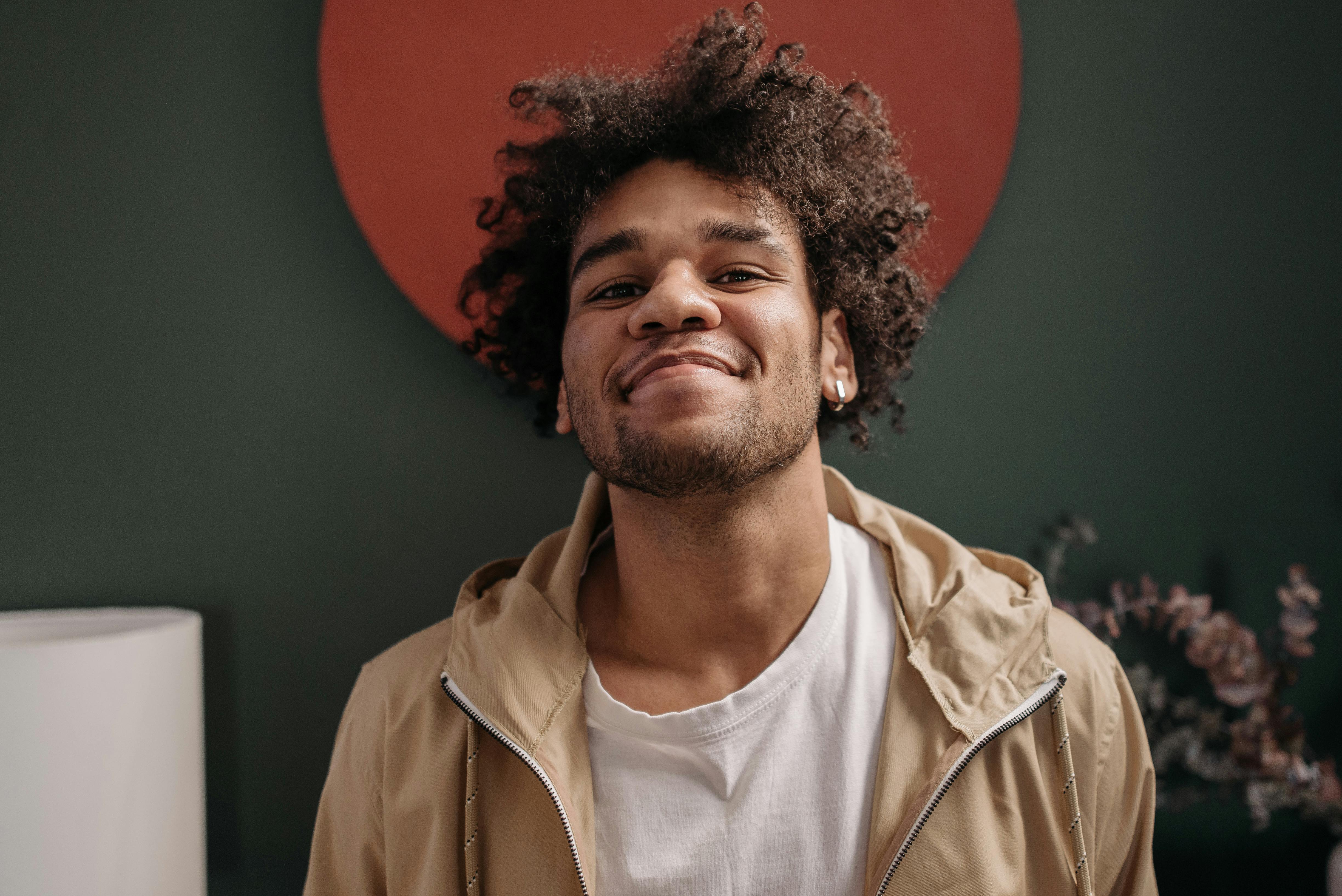 portrait of a smiling young mexican man