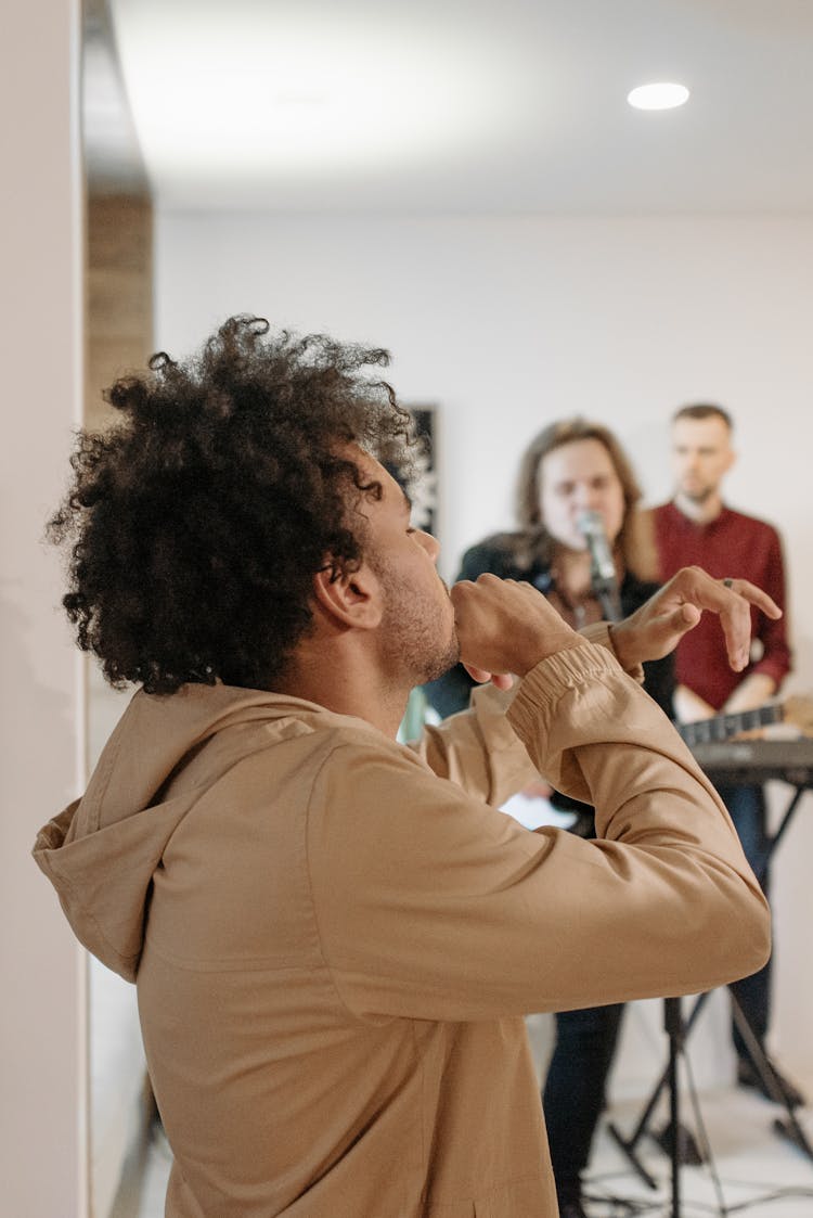 A Man Dancing At A Concert
