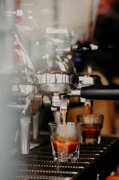 A vibrant close-up of espresso being brewed, showcasing rich coffee textures and colors.