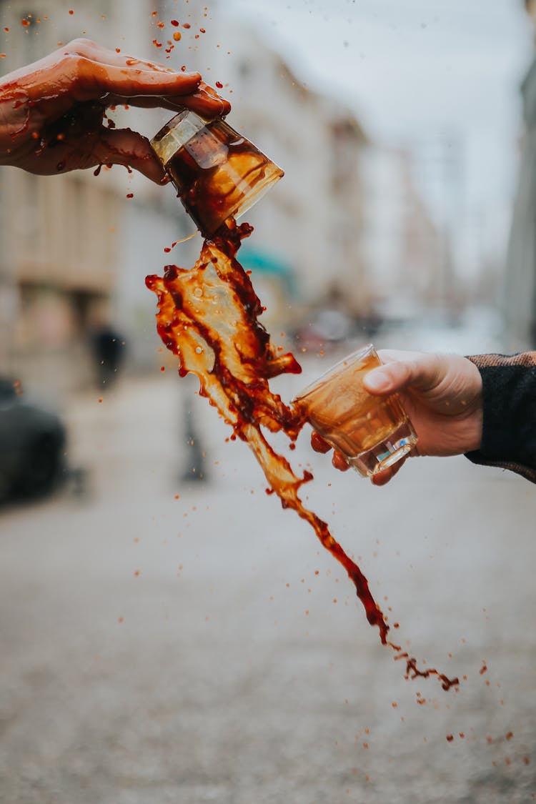 Tipping Drink From Glasses