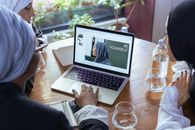 Macbook Pro on Brown Wooden Table