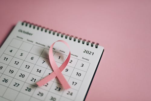 A Pink Ribbon on White Calendar