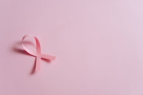 Pink Ribbon on Pink Surface