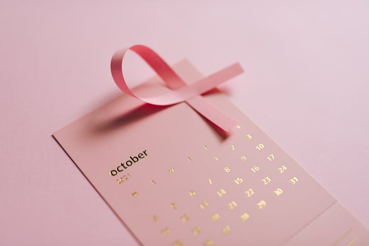 Close-up Shot Of Pink Calendar 