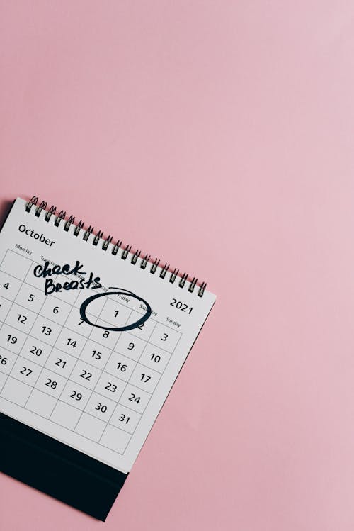Free Close-Up Shot of a Calendar on a Pink Surface Stock Photo