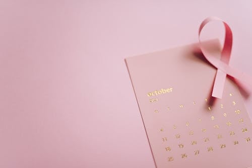 Free Close-Up Shot of a Pink Ribbon on a Calendar Stock Photo
