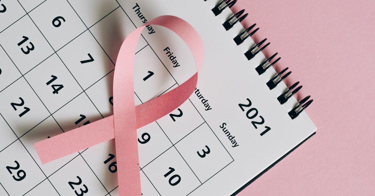 Pink Ribbon September A Pink Ribbon on a Calendar · Free Stock Photo