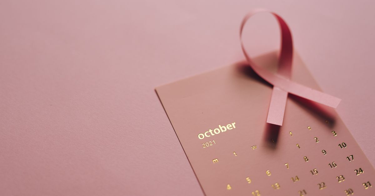 Pink Ribbon September Close-Up Shot of a Pink Ribbon on a Calendar · Free Stock Photo