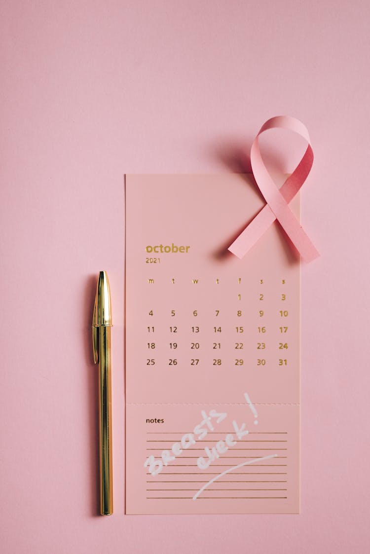 A Pink Ribbon On A Calendar