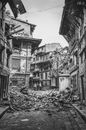 People Walking Near Wrecked Buildings