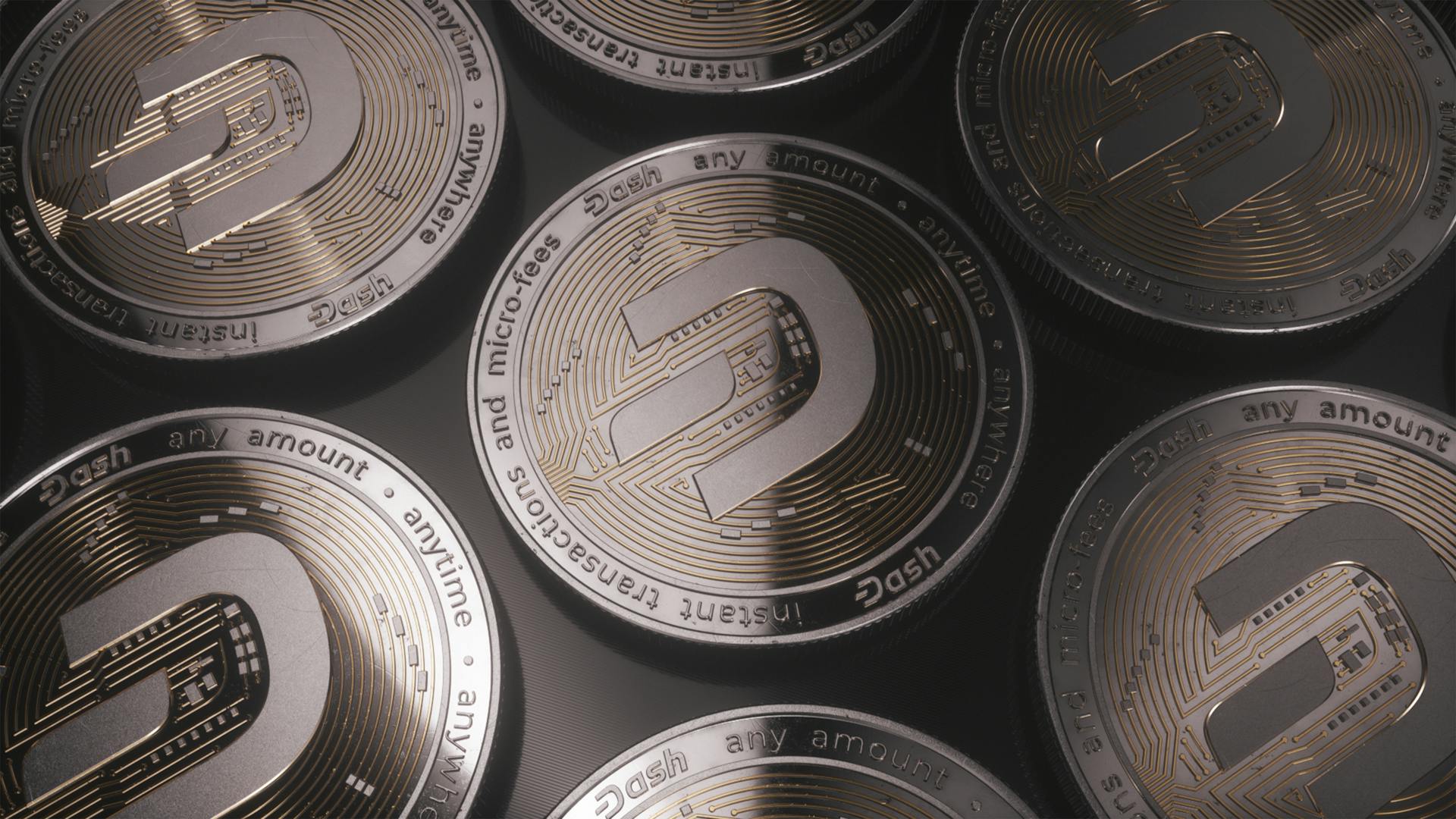 A detailed close-up view of Dash cryptocurrency coins with intricate designs highlighting digital currency.