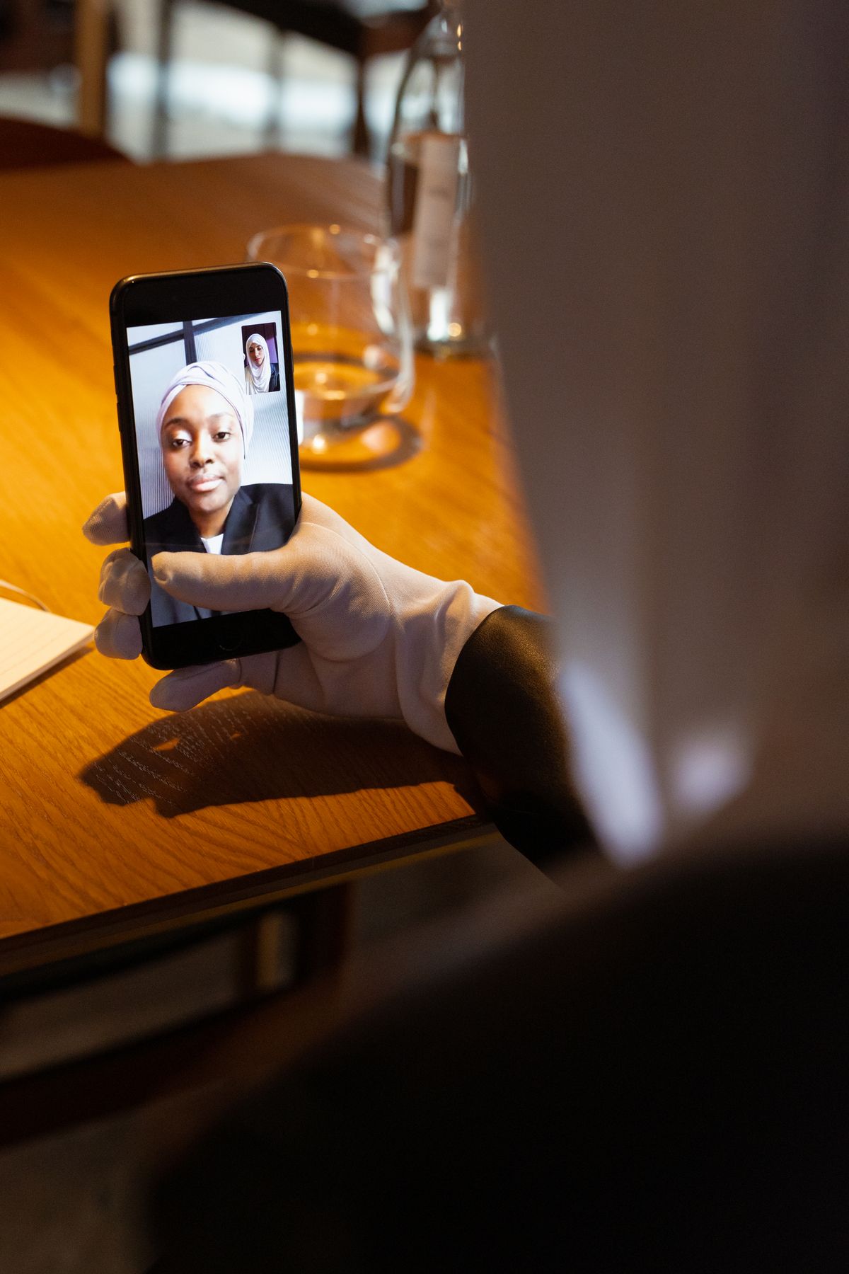 A person on a laptop learning to use Google Meet for a video call