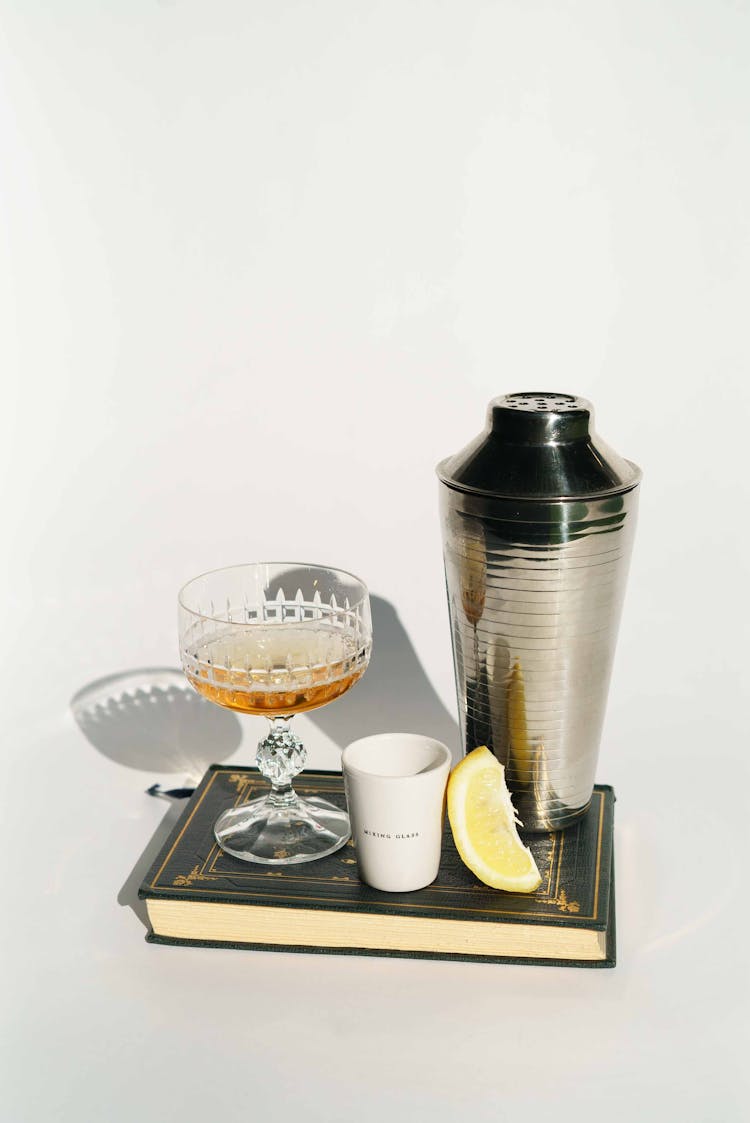 Glass Of Liquor With Coffee Near Shaker