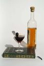 Manhattan cocktail with bottle of brandy