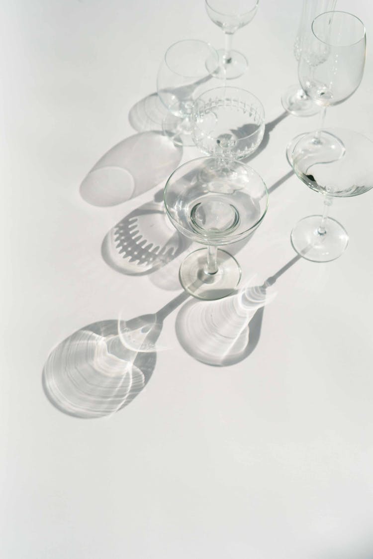 Set Of Transparent Glassware On White Table