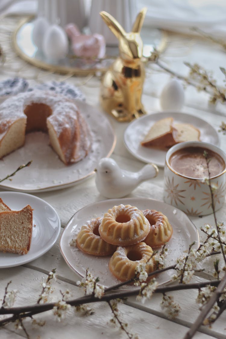 Bundt Cakes And Coffee On Table During Easter Celebration