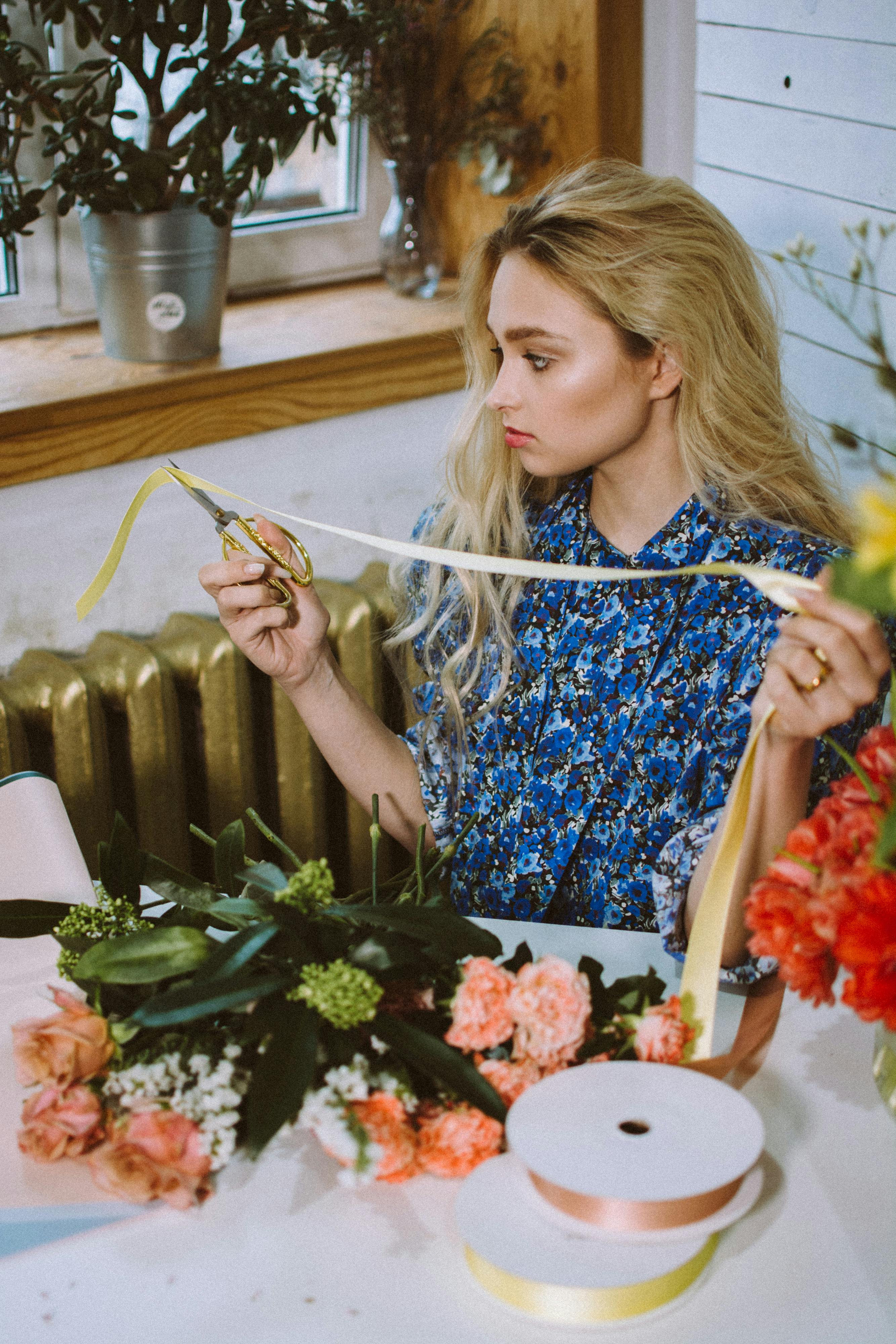 Pruners and scissors together with twine in florist shop · Free Stock Photo