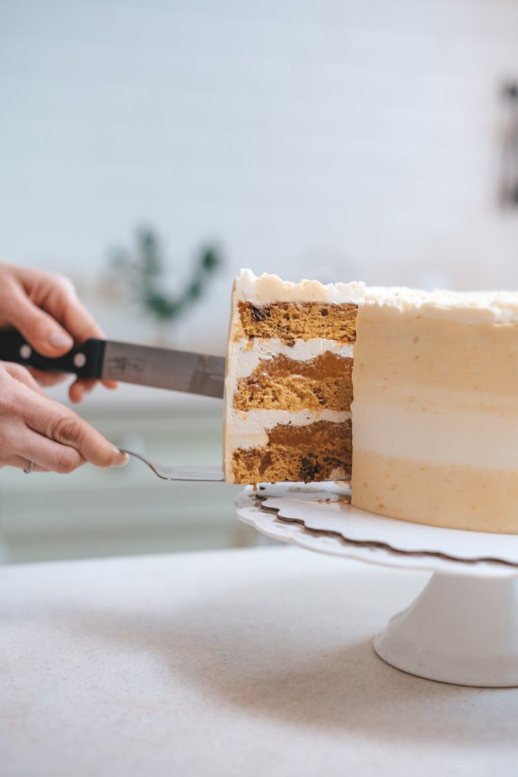 Anonymous Confectioner Cutting Sweet Cake