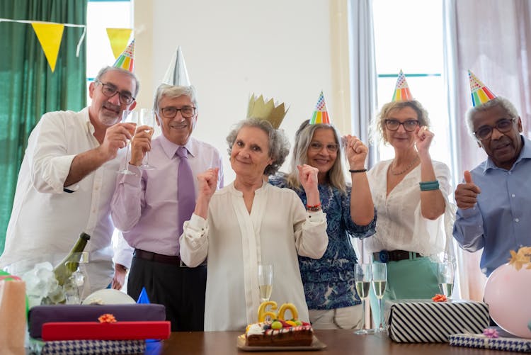 Elderly People Wearing Party Hats