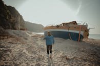 Man Walking on The Beach