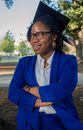 Woman in Blue Blazer and White Dress Shirt Wearing Black Framed Eyeglasses