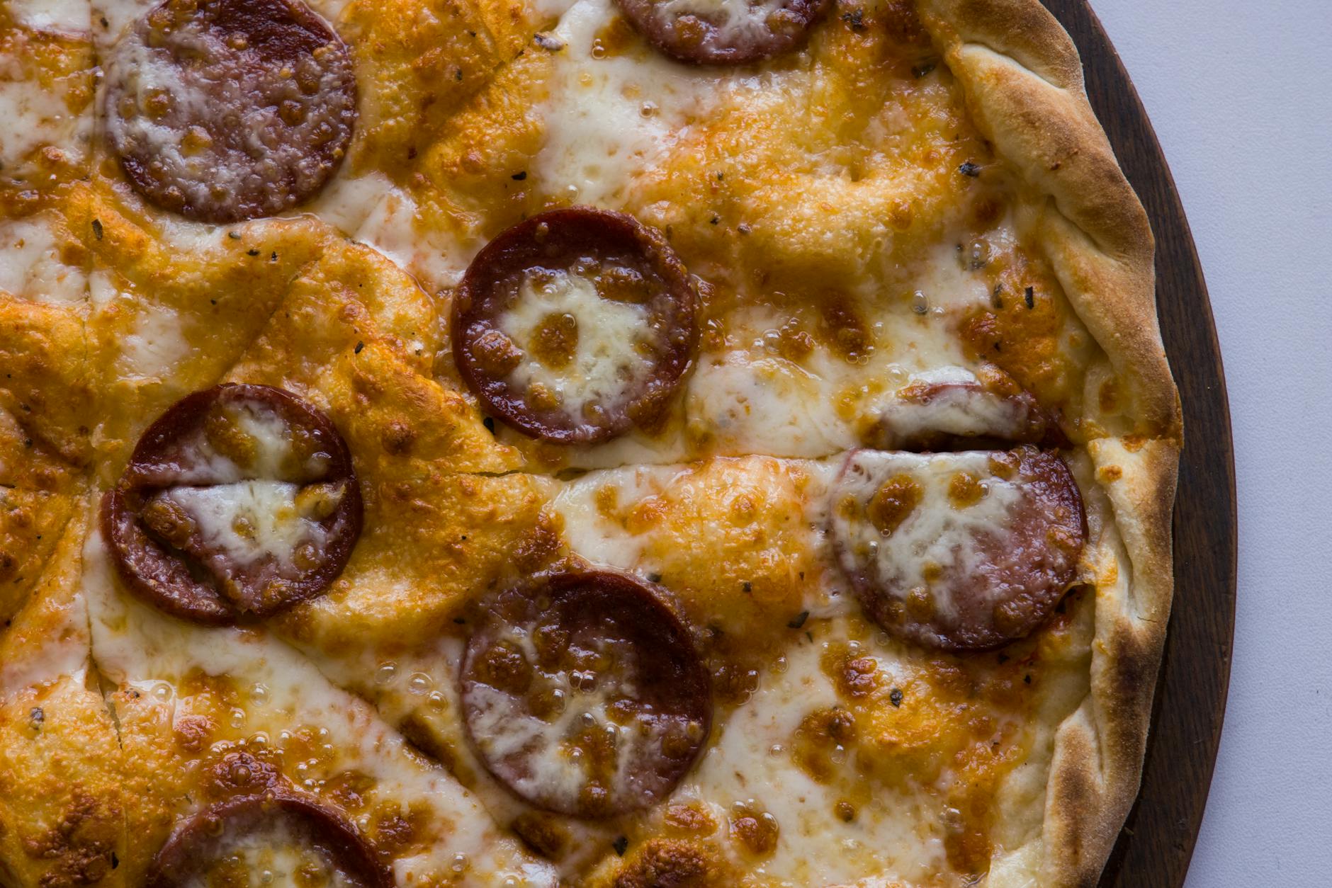 Delicious pepperoni pizza with melted cheese and crispy crust.