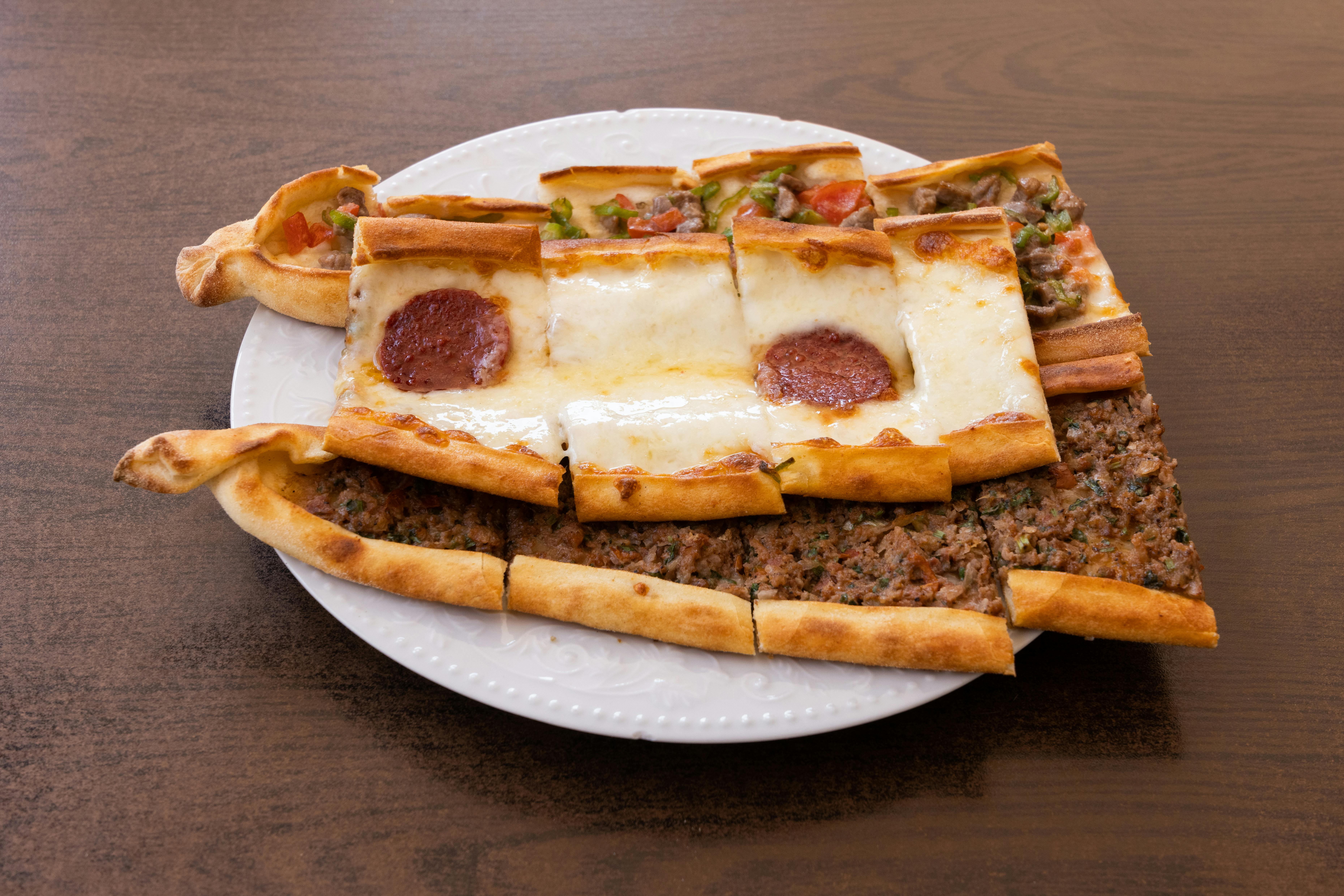 pizza on white ceramic plate