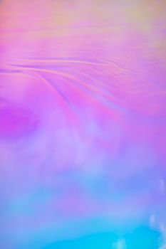 Colorful abstract gradient with rippling effect, ideal for creative backgrounds and designs.