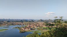 Landscape With Lake, Town and Mountains