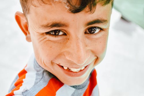 A Boy Smiling at the Camera